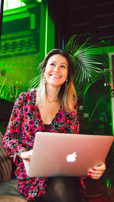 woman-laughing-happy-laptop